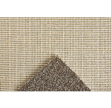 Detail van een tapijt met textielrug
