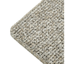 Detailopname van een tapijt met geweven textuur