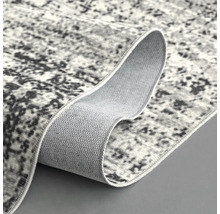 Grijs tapijt met abstract patroon