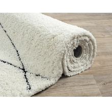 Opgerolde, laagpolige vloerkleed met patroon