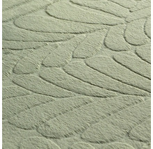 Close-up van een vloerkleed met bladmotief