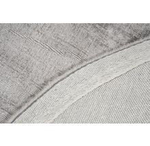 Detailweergave van een grijs tapijt met textuur