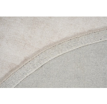 Detailweergave van een tapijt met textielrug