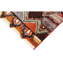 Detail van een tapijt met geometrische patronen