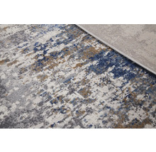 Tapijt met abstract patroon in verschillende grijstinten, blauw en beige
