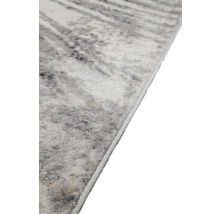 Detail van een tapijt met abstract patroon