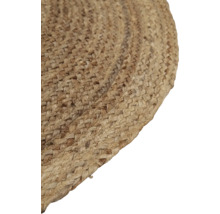 Detail van een rond vloerkleed van jute.