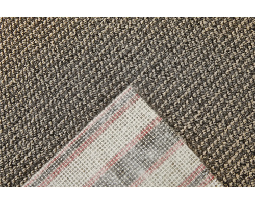 Detailopname van een getuft tapijt met textielrug