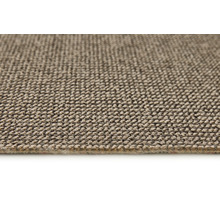 Close-up van een beige tapijt met textielstructuur