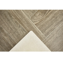 Detailopname van een vinylvloer in houtlook met geluidsreductie