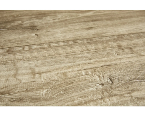 Close-up van een laminaatvloer met houten structuur