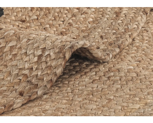 Detail van een gevlochten vloerkleed van natuurlijke vezels