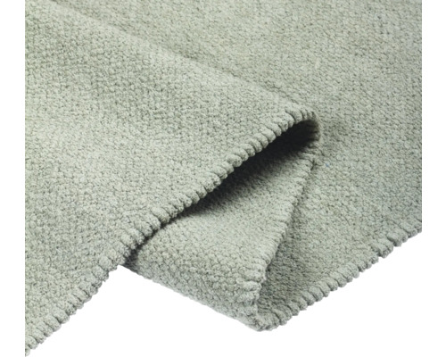 Detailweergave van een grijs tapijt met textuur