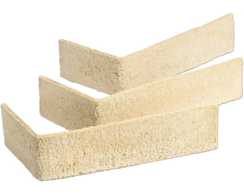 Drie beige, hoekvormige steenstrips met een gestructureerd oppervlak.