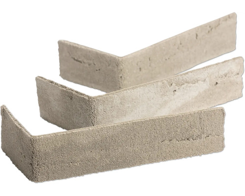 Drie beigegrijze steenstrips in L-vorm voor hoeken met een natuurlijke ruwe steenstructuur.
