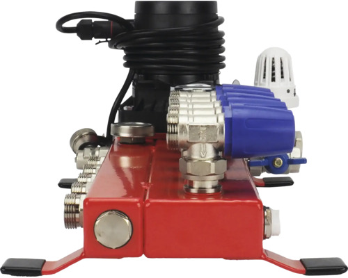 Vloerverwarmingsverdeler rood met pomp en kleppen voor verwarmingssystemen.