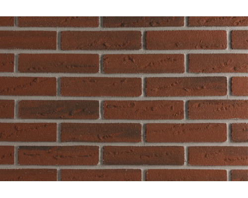 Getextureerde bakstenen muur met een onregelmatig oppervlak voor gevels of metselwerk