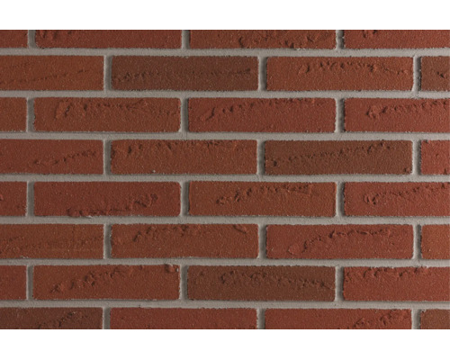 Gestructureerde bakstenen muur met ruw oppervlak in baksteenlook