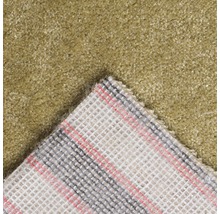 Detailaanzicht van een tapijt met textielrug