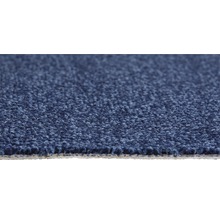 Close-up van een blauw tapijt met lusstructuur.