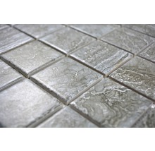 Close-up van vierkante mozaïektegels met marmerlook