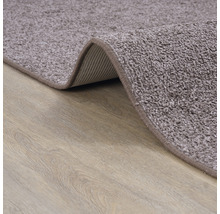 Detailweergave van een tapijt met korte pool