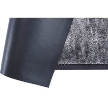 Gedetailleerde weergave van een zwarte antislipmat met textieloppervlak