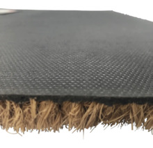 Detailweergave van een kokosvezel deurmat met rubberen rug