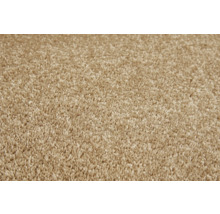 Close-up van een beige tapijt.