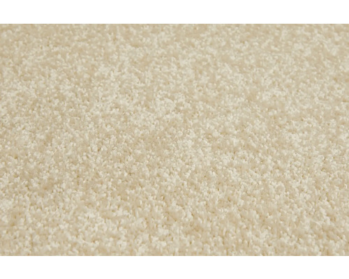 Close-up van een beige tapijt met korte pool