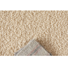 Close-up van een beige tapijt met pool