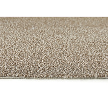 Close-up van een beige tapijt met korte pool