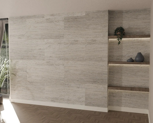 Moderne wandpanelen met lichte steenlook op een muur in een woonkamer met verlichte houten planken en visgraatvloer.