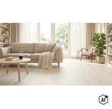 Lichte, modern ingerichte woonkamer met lichte laminaatvloer, gezellige bank, salontafel en een grote plant voor een glazen pui. (Image AI modified or generated)