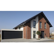 Moderne eengezinswoning met garage en bakstenen elementen