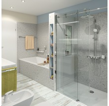 Badkamer met ligbad, douche, bidet en wastafel