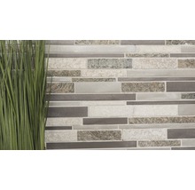 Muur van mozaïektegels met grasdecoratie