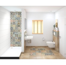 Badkamer met douche, wastafel en toilet en patroontegels
