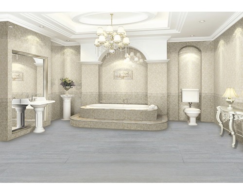 Lichte badkamer met bad, wastafel, toilet en tegels