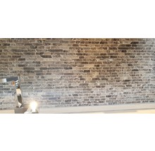 Wanddecoratie met steenpanelen in baksteenlook
