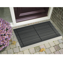 Schoonloopmat voor een voordeur met bloemen