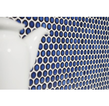 Detailopname van blauwe mozaïektegels