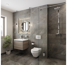 Moderne badkamer met wastafel, spiegel, toilet en douche