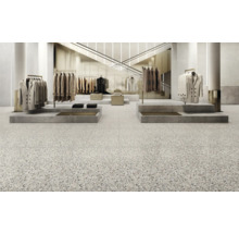 Vloertegels in kledingwinkel met terrazzo patroon