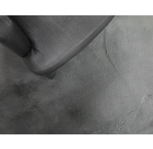 Detailweergave van een fauteuil op een tapijt