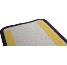 Reinigingspad met plakstrips voor bevestiging.