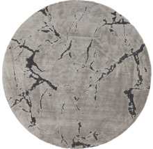Rond tapijt met abstract patroon