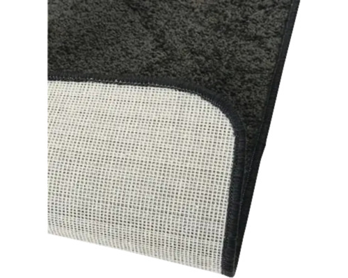 Achterkant van een badmat met antislip coating