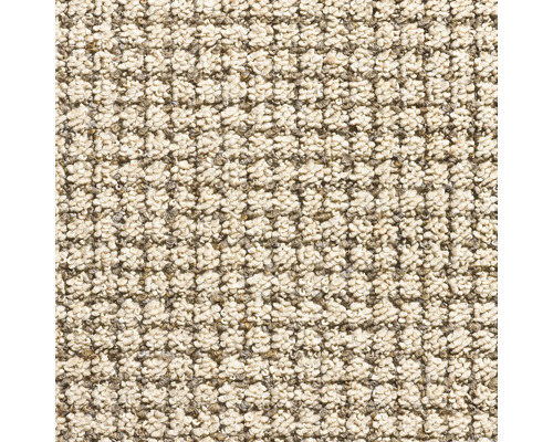 Close-up van een beige tapijt met gemêleerde textuur