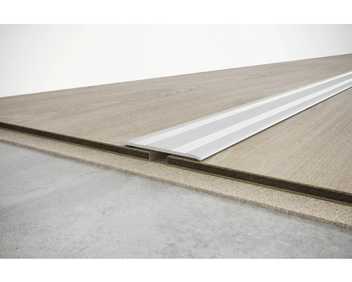 Aluminium overgangsprofiel op laminaatvloer